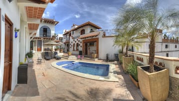 Outdoor pool, open 9:30 AM to 9:00 PM, pool umbrellas, pool loungers