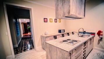 Deluxe House, Multiple Beds, Non Smoking | Private kitchen | Full-sized fridge, microwave, oven, stovetop