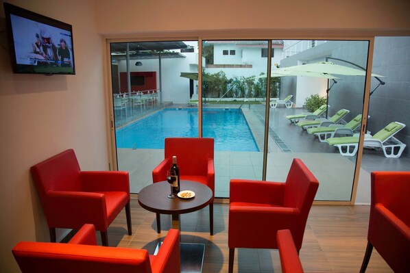 Breakfast, lunch served; local and international cuisine, pool views 