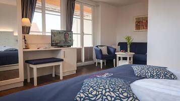 32-inch flat-screen TV with cable channels, TV