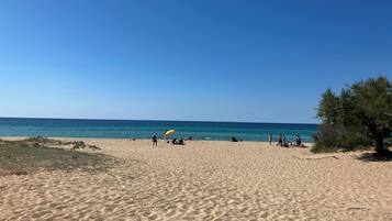 On the beach, beach towels