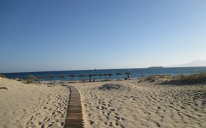 Una spiaggia nelle vicinanze, teli da spiaggia