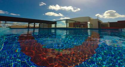 Condo de luxe avec piscine partagée et cuisine moderne - prÚs de la plage
