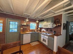 Fridge, microwave, oven, stovetop - Cozy Waterfront Cottage | Full Kitchen + Fun (Burnet)