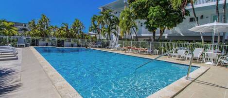 Outdoor pool, open 8:30 AM to 8:00 PM, pool umbrellas, sun loungers