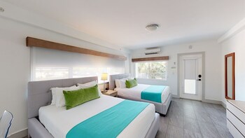 Junior Studio Suite, Non Smoking, Resort View | Down comforters, in-room safe, individually decorated, desk at Park Royal Miami Beach