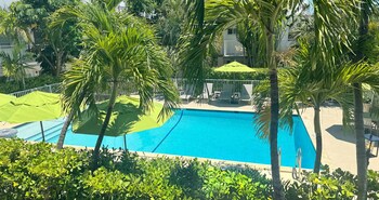 Outdoor pool, open 8:30 AM to 8:00 PM, sun loungers at Park Royal Miami Beach