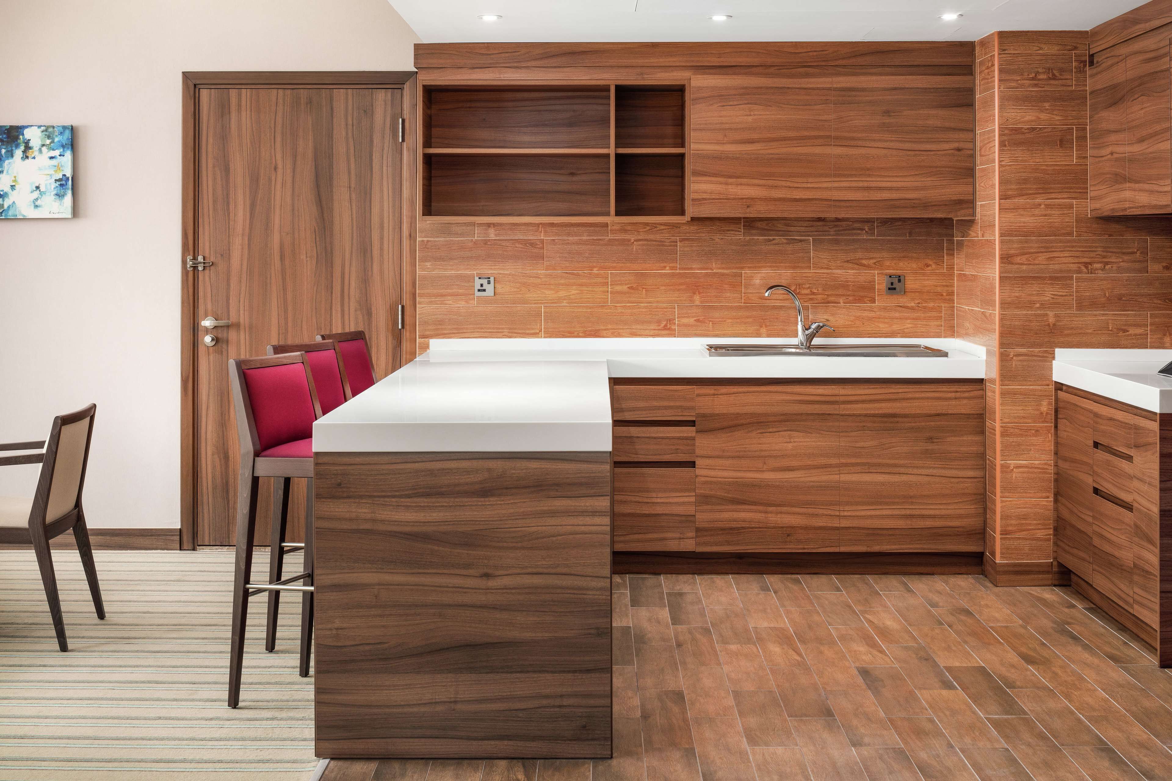 suite, 2 bedrooms | private kitchen | mini-fridge, cleaning supplies, paper towels