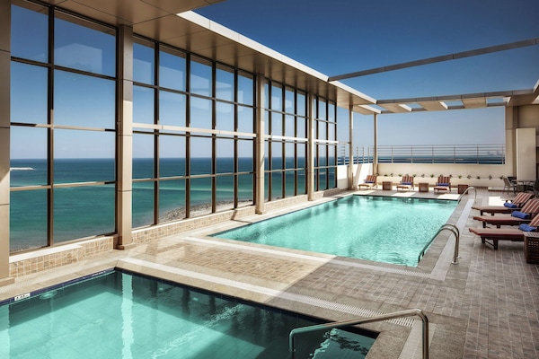 Outdoor pool, open 8:00 AM to 7:00 PM, sun loungers