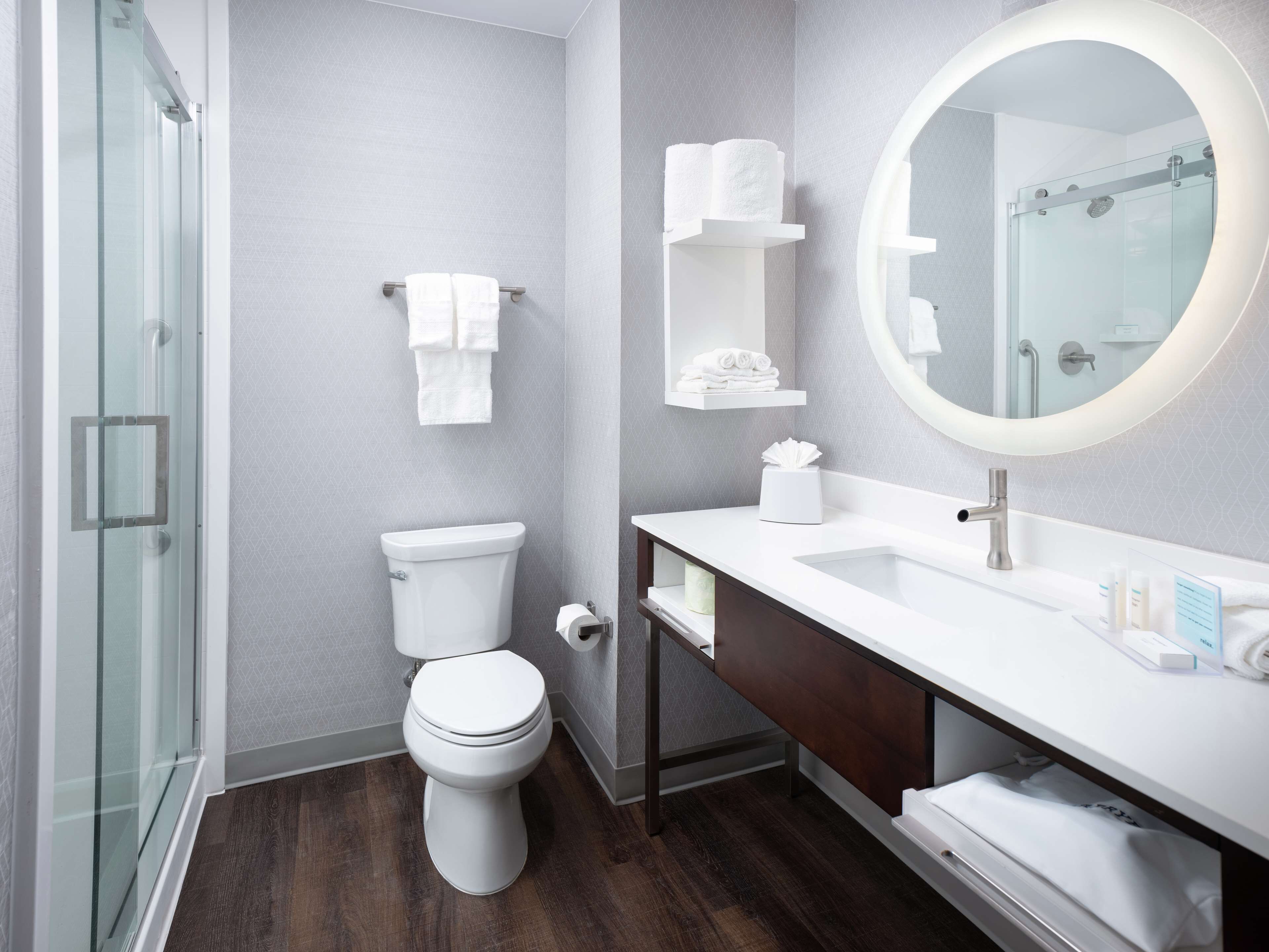 room, 1 king bed, refrigerator & microwave | bathroom shower