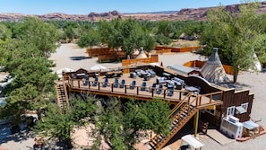 Guests can enjoy scenic views of the surrounding landscape from the resort's expansive deck.
