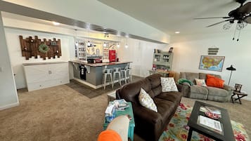 Flat-screen TV, Netflix, DVD player, books