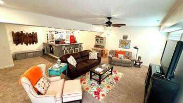 Flat-screen TV, Netflix, DVD player, books