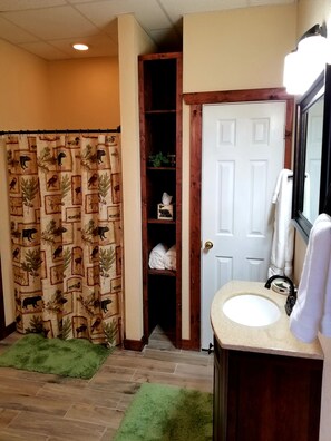 Bathtub, hair dryer, towels, soap