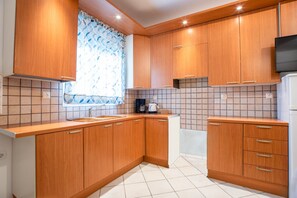 Fridge, electric kettle, paper towels