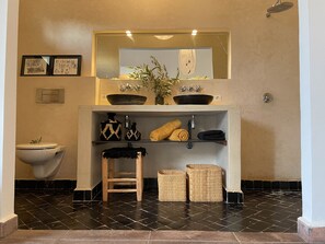 Shower, hair dryer, towels, soap