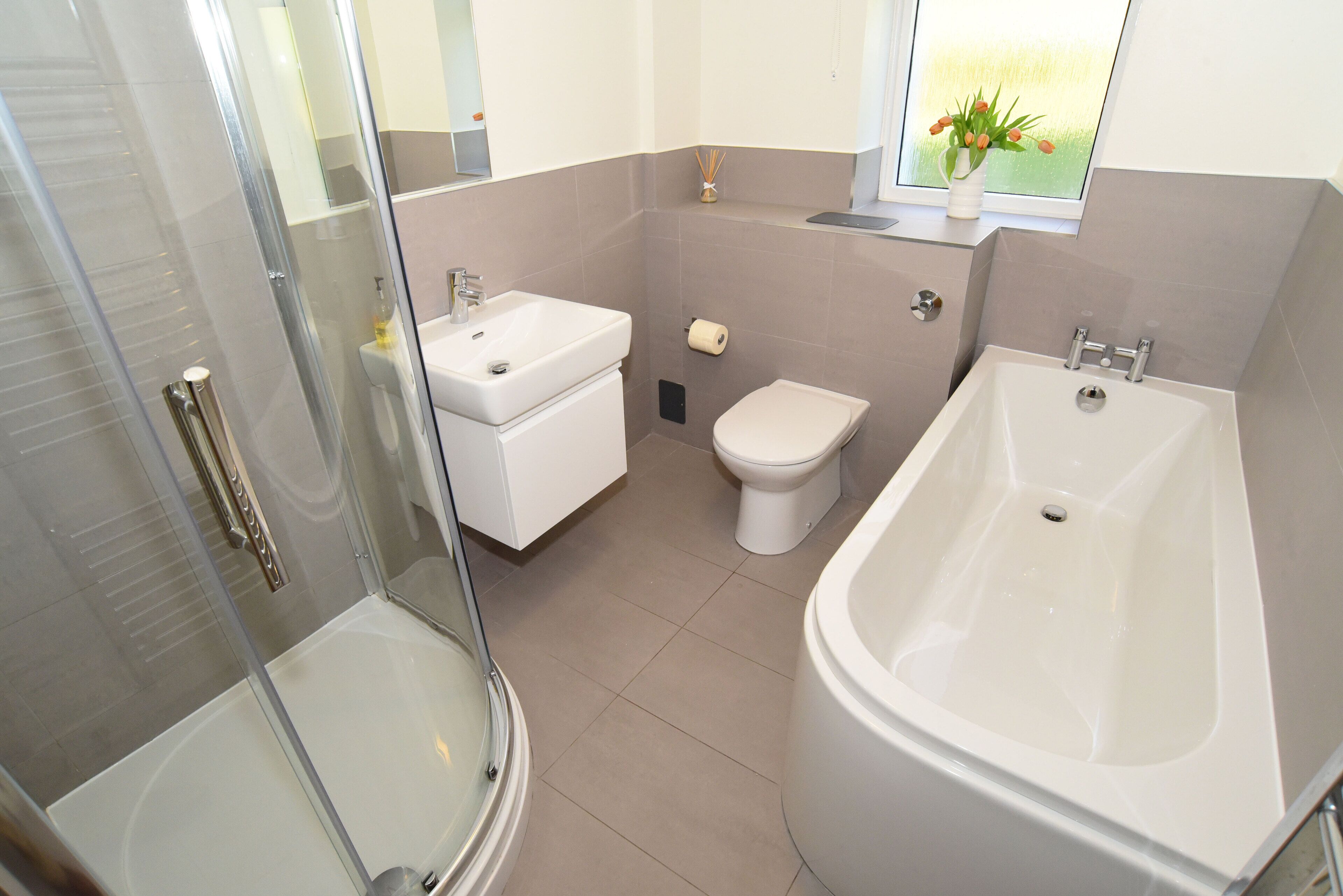Bathtub, hair dryer, towels, soap