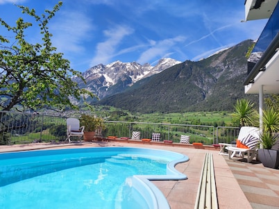 Holiday house inmidst of ski areas with pool, sauna, solarium & tiled stove