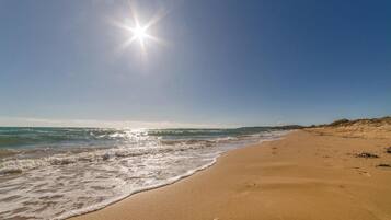 Perto da praia, prática de pesca
