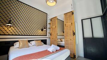 1 habitación, tabla de planchar con plancha, cuna de viaje y wifi