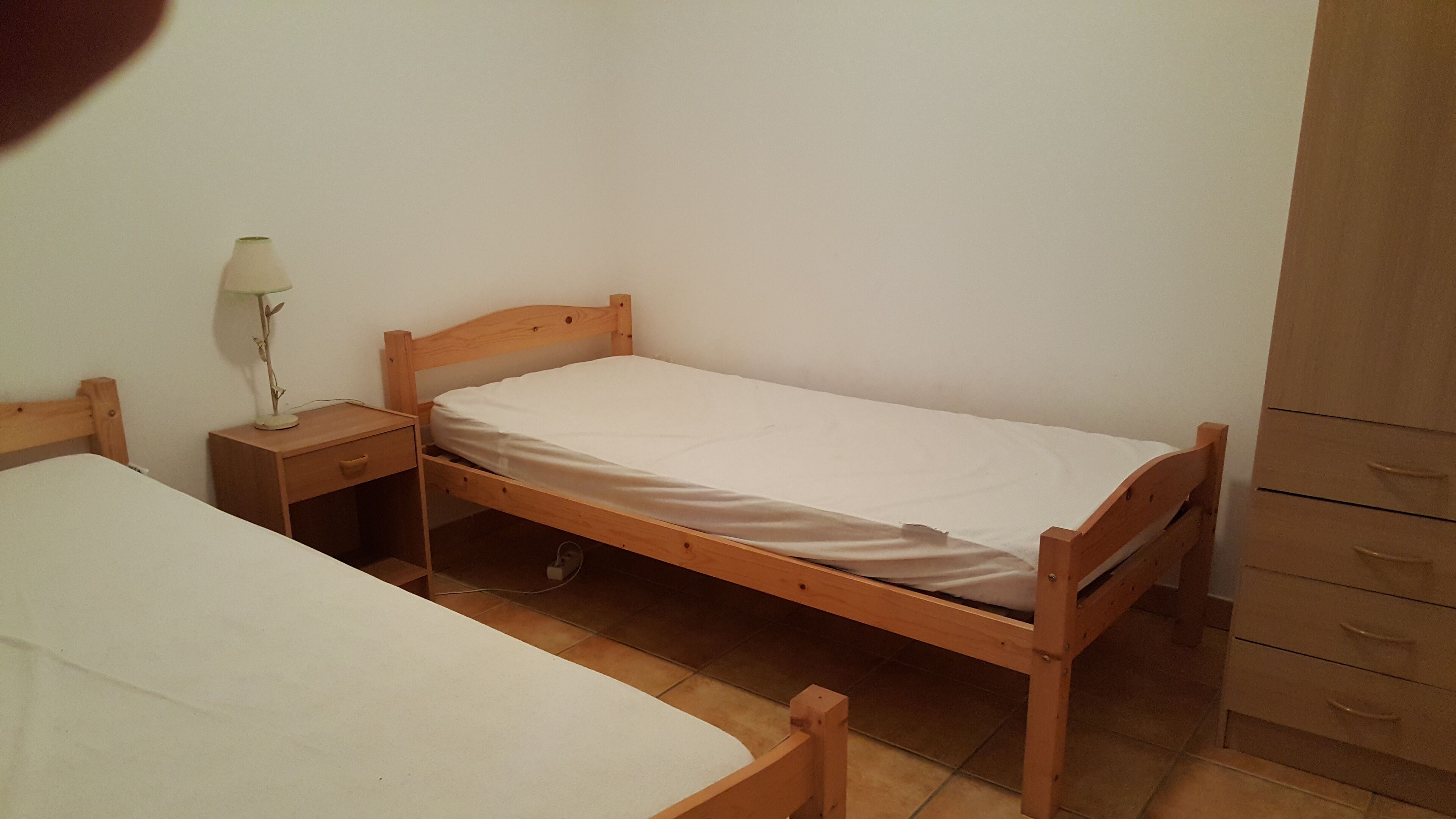 2 slaapkamers, een strijkplank/strijkijzer, beddengoed