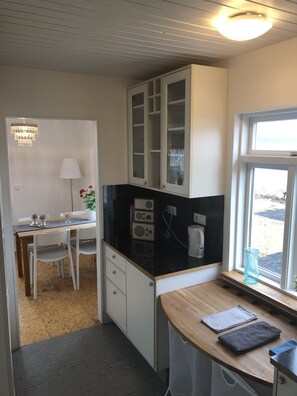 Cottage, 2 Bedrooms, Mountain View | Private kitchen | Fridge, microwave, oven, stovetop - Vellir Grenivik a home with a view (Grenivík)