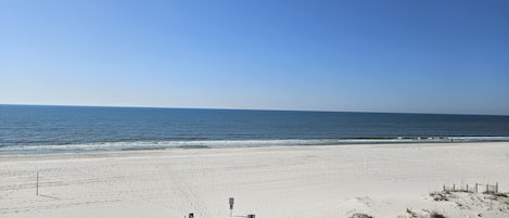 On the beach, sun-loungers