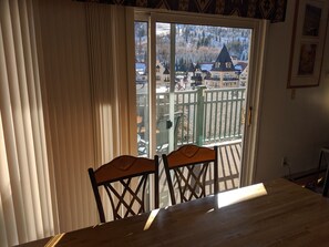 Enjoy a charming view of the town's traditional architecture from this room's large window.