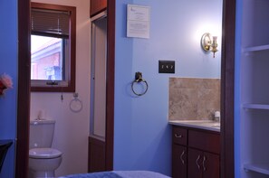 Combined shower/tub, hair dryer, towels, soap