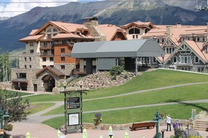 Experience the charm of our traditional hotel, surrounded by lush green lawns and scenic mountain views.