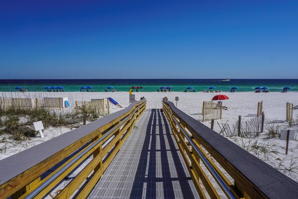On the beach, sun-loungers, beach towels