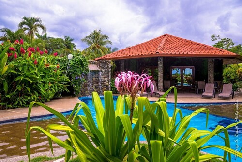 Jaco Beach Ocean Front and Center of town !! Gate Walks Out Onto Beach!!