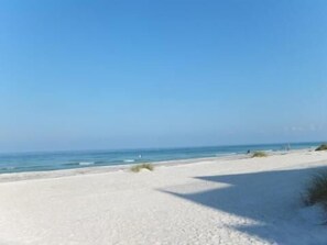 On the beach, sun loungers, beach towels