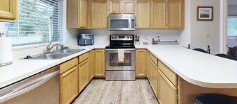 Comfortable Big Sky condo with deck, W/D & WiFi - across the street from lift