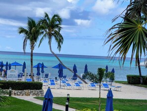 On the beach, sun-loungers, beach towels