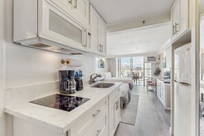 Fridge, microwave, stovetop, coffee/tea maker