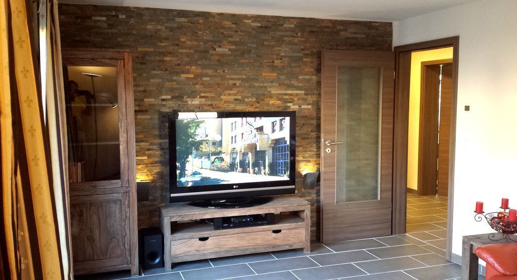 Bloc d'apartaments de luxe (Kolonial) | Sala d'estar | Televisor de pantalla plana de 50 polzades amb canals per satèl·lit 