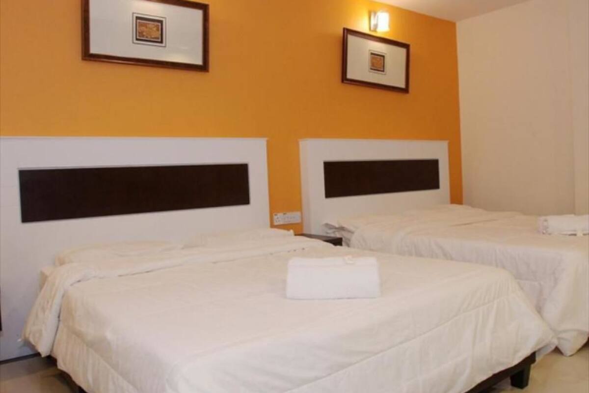 Family Quadruple Room | In-room safe, desk, blackout drapes, iron/ironing board
