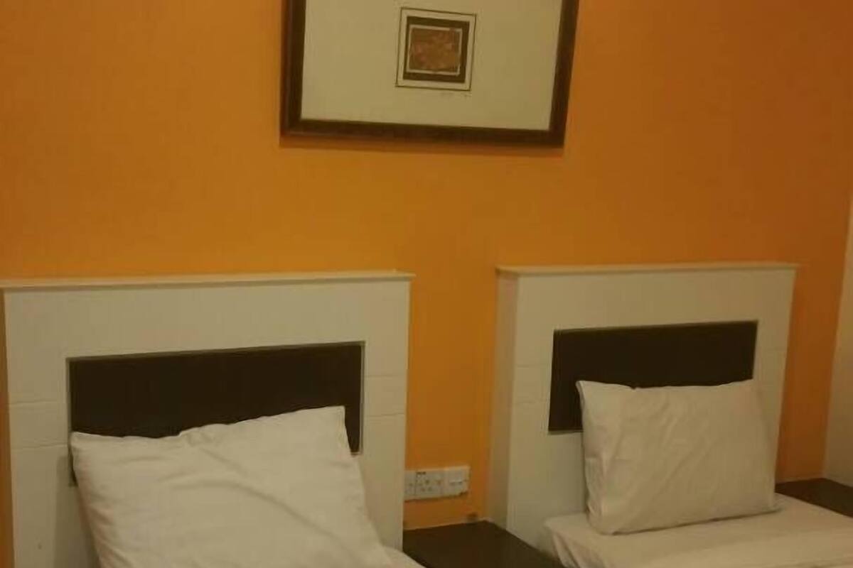Standard Twin Room | In-room safe, desk, blackout drapes, iron/ironing board