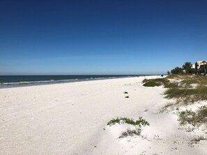 On the beach, sun-loungers, beach towels