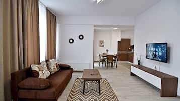 Apartment 22, Balcony, Park View | Living room | 40-inch LCD TV with cable channels, TV