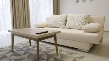 Apartment 25, Balcony | Living area | 40-inch LCD TV with cable channels, TV