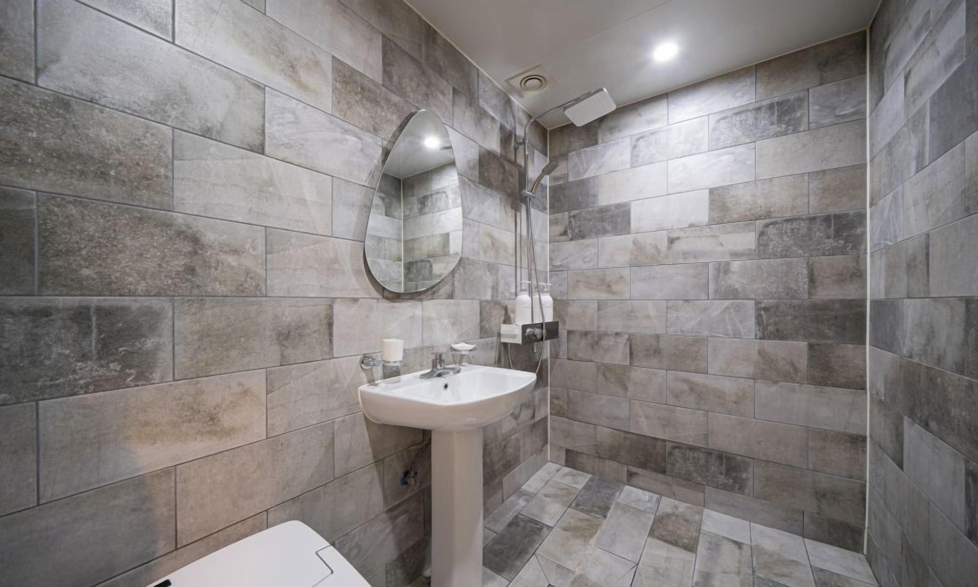 business suite | bathroom | free toiletries, hair dryer, slippers, bidet