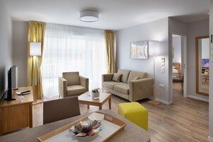 Standard Apartment | Living area | Flat-screen TV