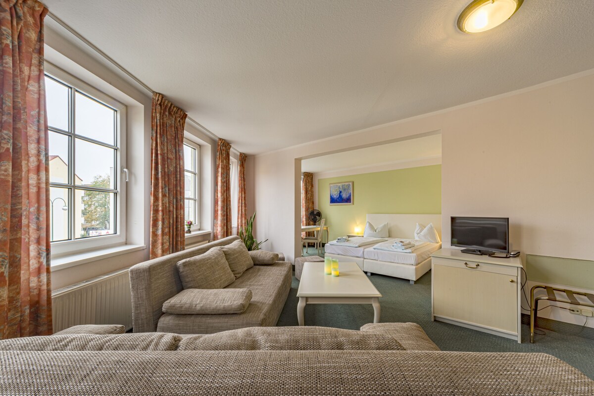 Family Suite | Living area | Flat-screen TV