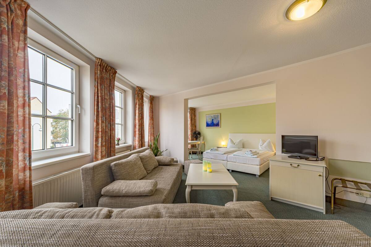 Family Suite | Living area | Flat-screen TV