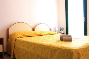 Apartamento, 1 quarto | Berços (sobretaxa), roupa de cama
