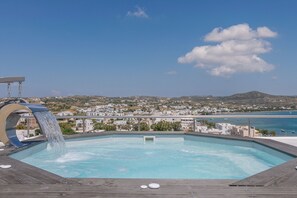 Seasonal outdoor pool, pool loungers
