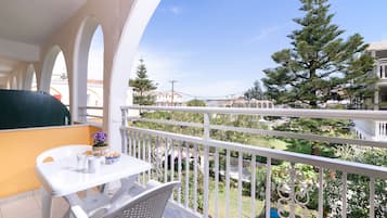 Triple Room, Garden View | Balcony view