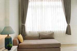 One-Bedroom Apartment with Big Balcony | Living room | 32-inch flat-screen TV with cable channels, TV - M-H Apartment Hotel (Ho Chi Minh City)